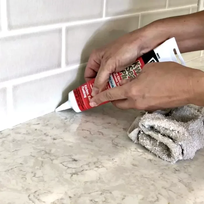 how to caulk kitchen countertops