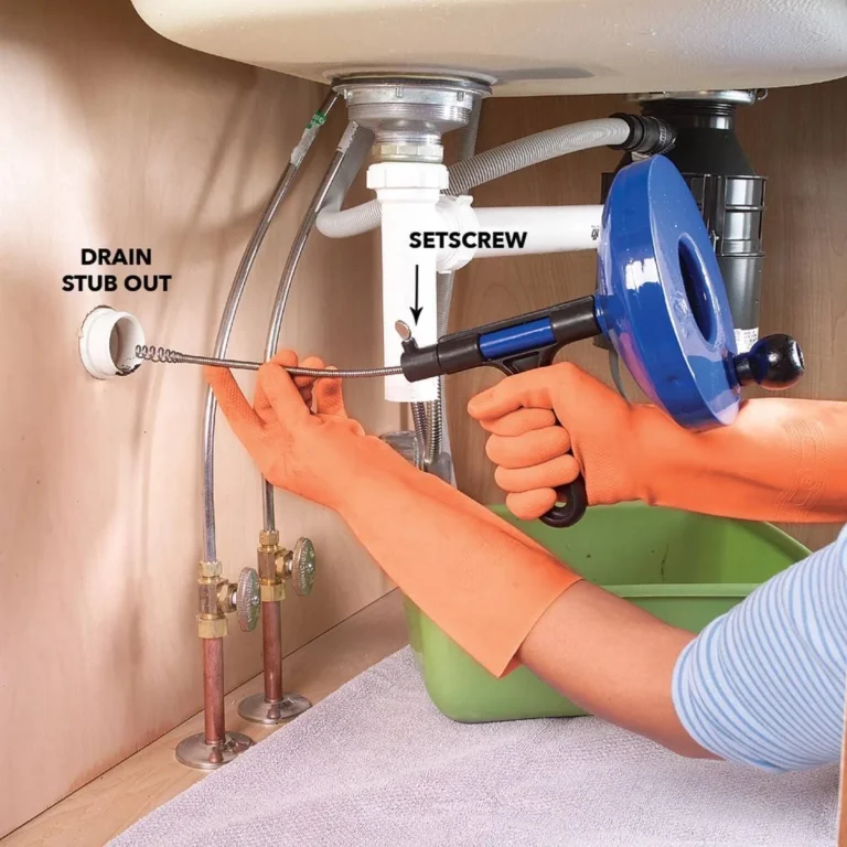 how to use a drain snake kitchen sink