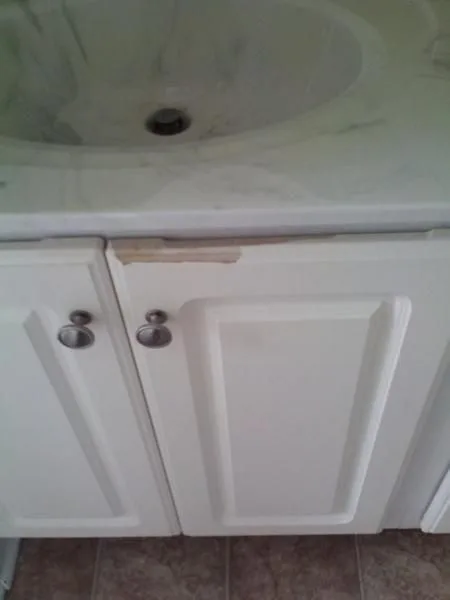 laminate cabinet water damage