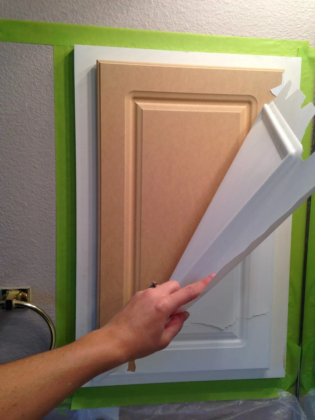 peeling paint on kitchen cabinet